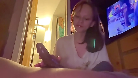 Big cock is going in and out of her mouth as she's eating it