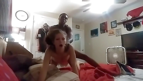 Amateur interracial threesome with a brunette and a white dick