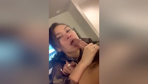 Busty whore giving a deepthroat blowjob in the camera