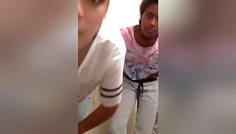 Ebony lesbians are playing with their pussies in a tight jeans video