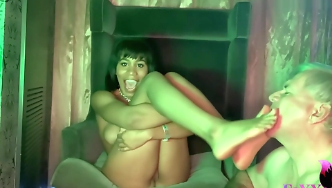 Brunette lady with red ass is doing a foot fetish with her partner