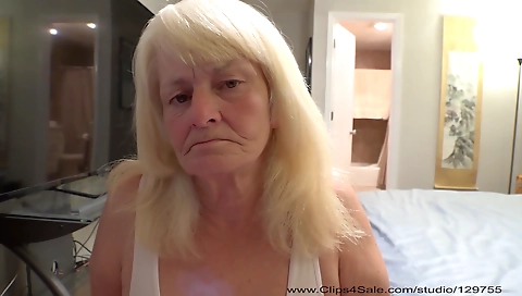 Mature blonde is getting fucked in her hairy pussy