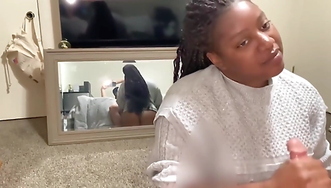 Black-haired ebony babe gives a hard dick in g-string